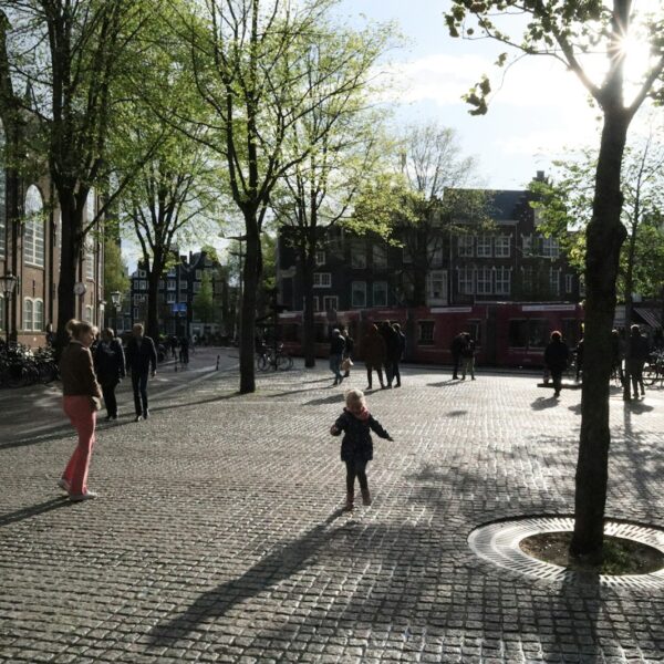 people walking on sidewalk during daytime