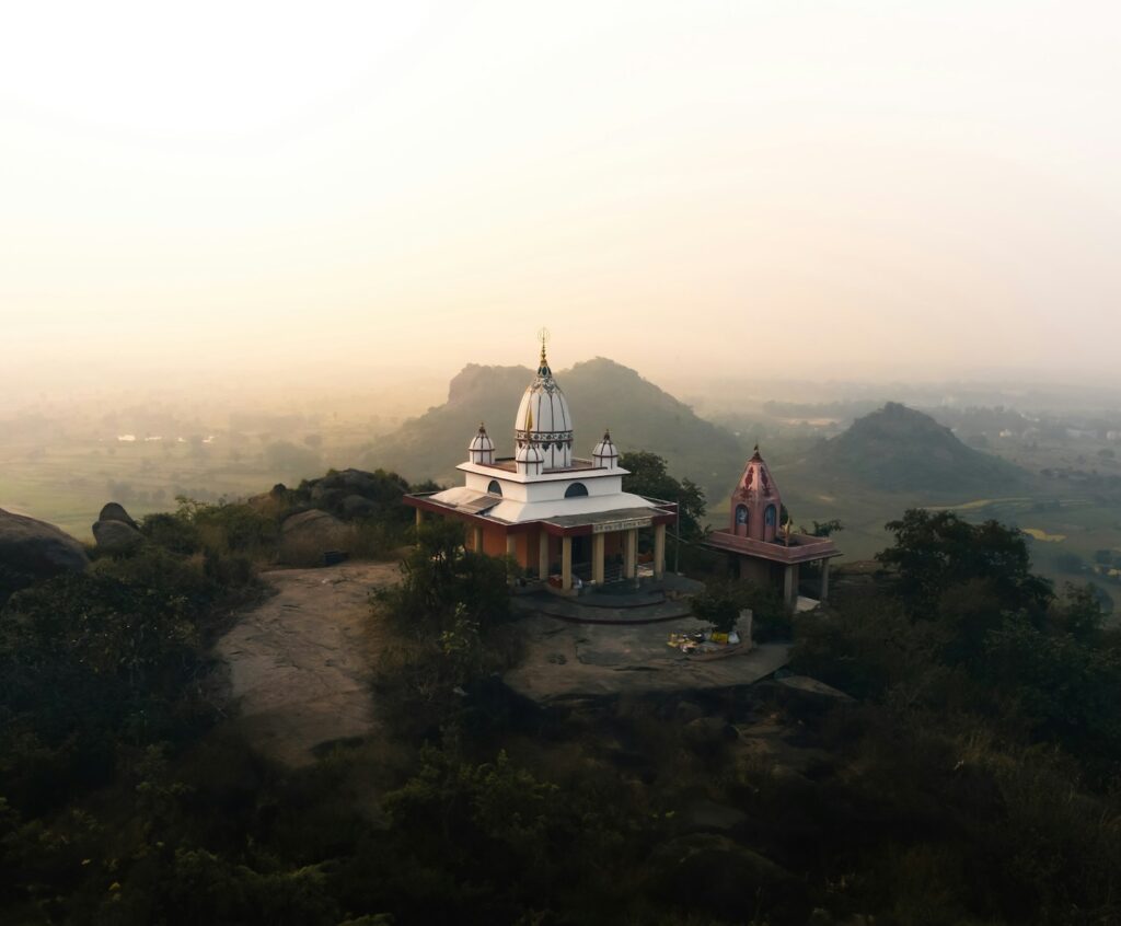 A small white building on top of a hill