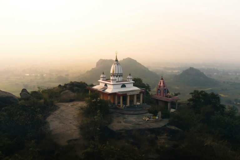 A small white building on top of a hill