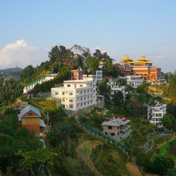 a hill with a bunch of houses on top of it
