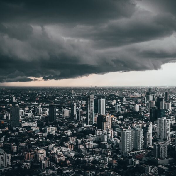 dark cloud above city buildings