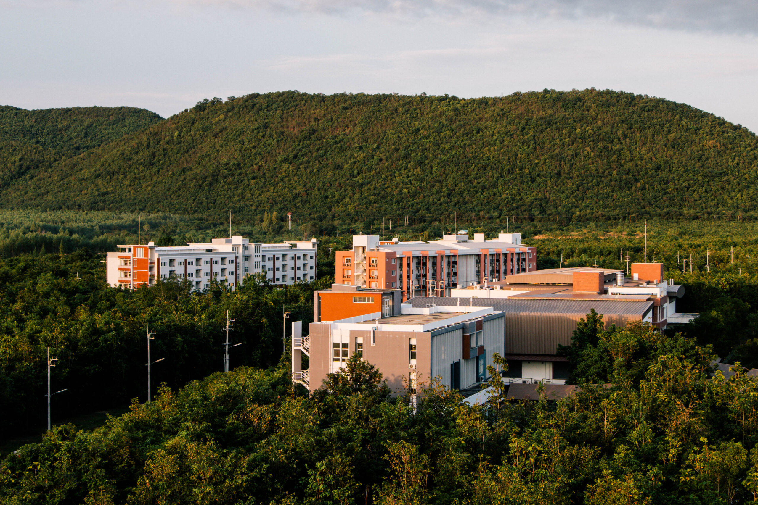 KMUTT campus in a green hillside setting
